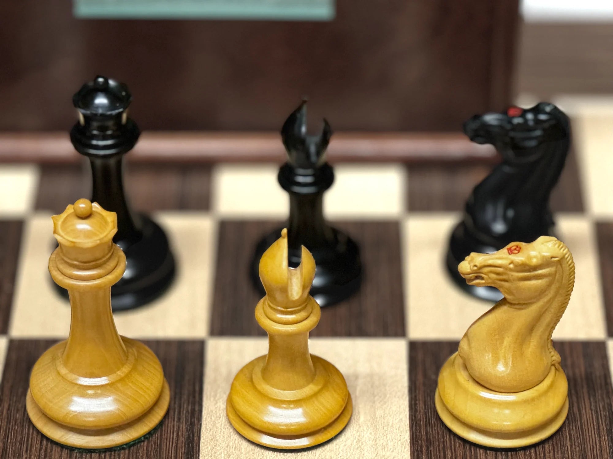 Luxury 1850 reproduction chess set on a traditional wooden table