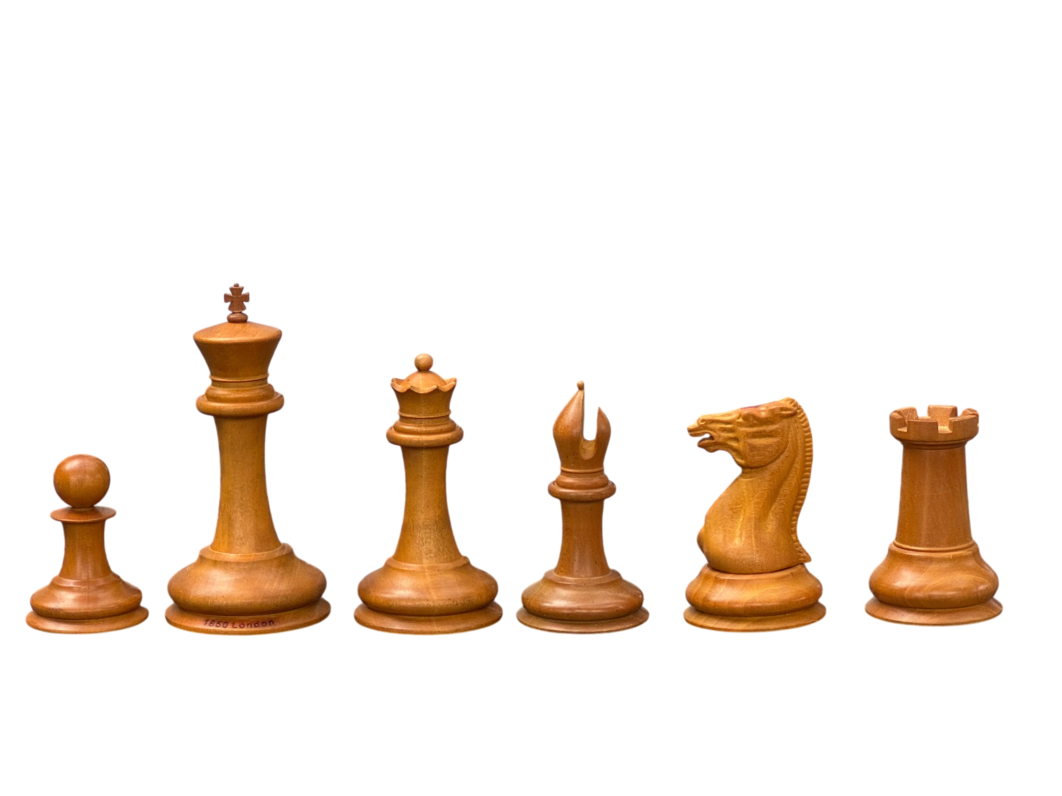 Line-up of historically inspired antique boxwood Staunton chess pieces