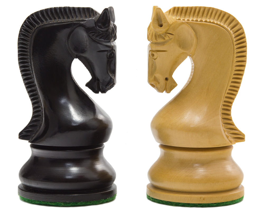 Close view of black and natural Leningrad-style carved chess knights