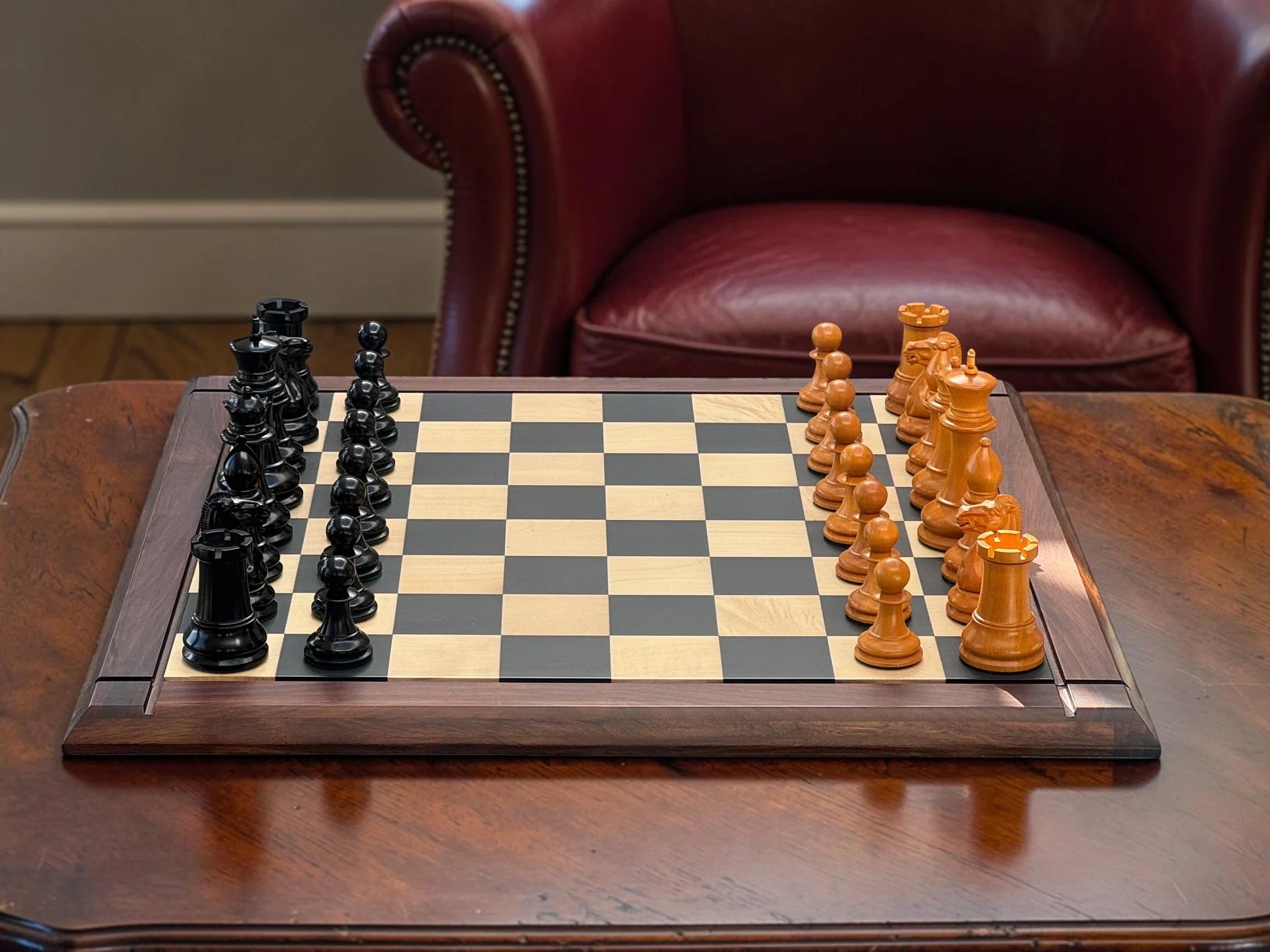 Luxury Jaques reproduction chess set displayed on a traditional wooden table